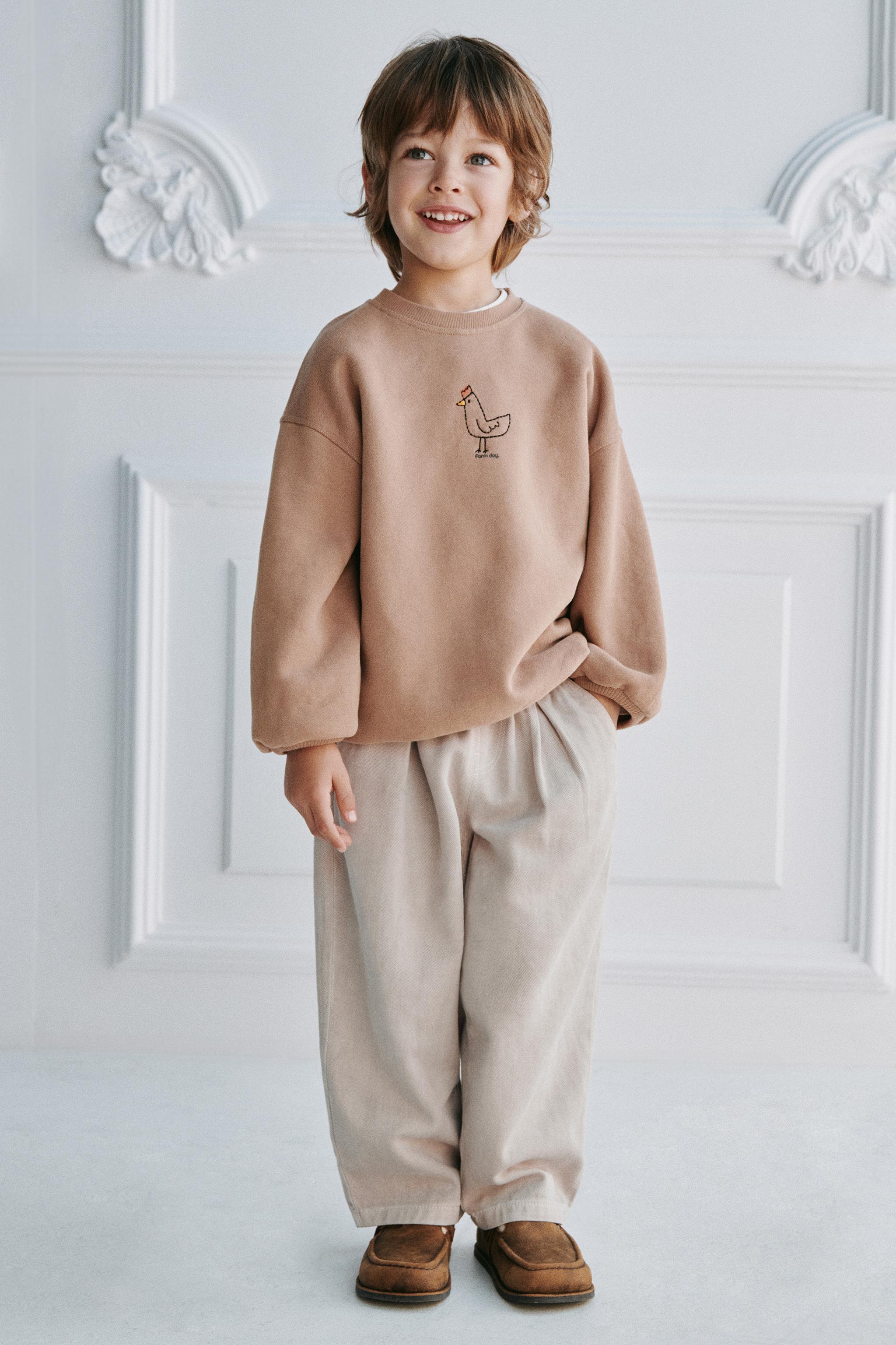 EMBROIDERED ROOSTER SWEATSHIRT