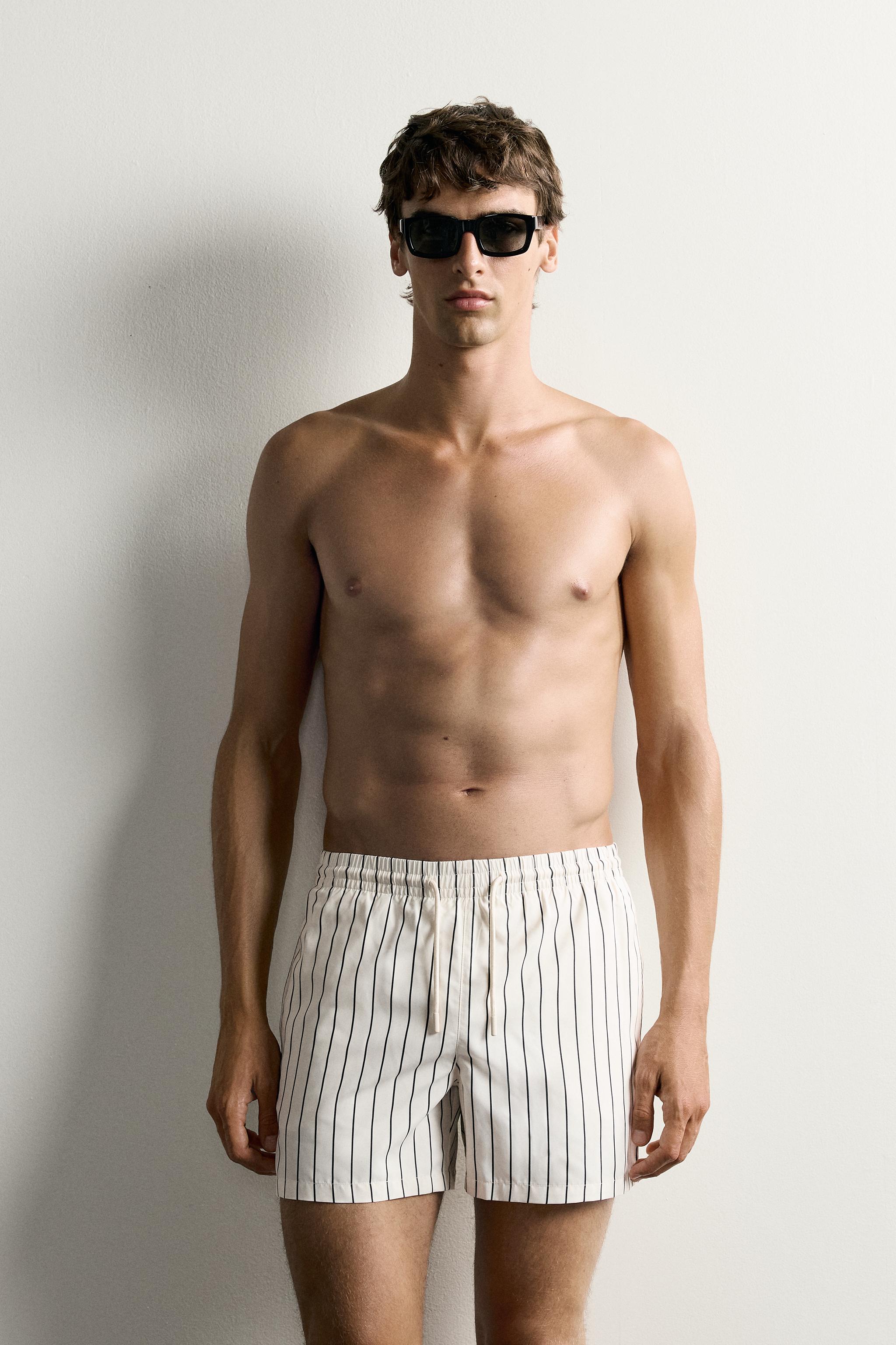 STRIPED MID-LENGTH SWIM TRUNKS
