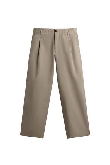 PANTALÓN CHINO PLIEGUES - Arena de Zara