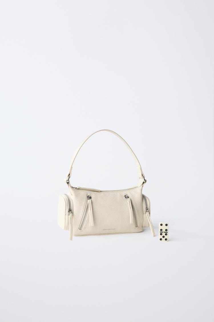 Bolsa de hombro con detalle de cierre 6