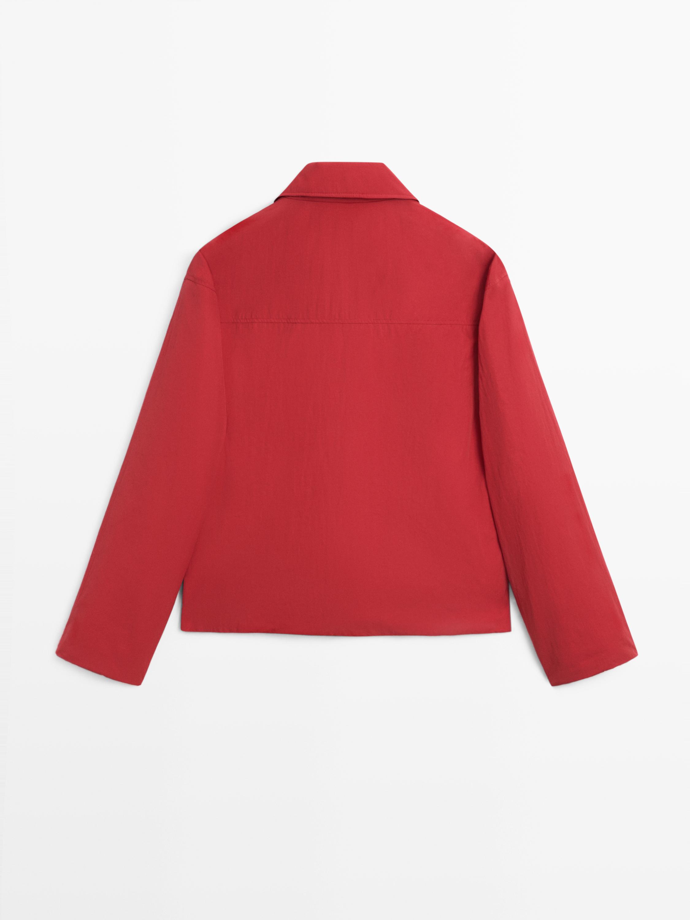 Short padded jacket with pockets