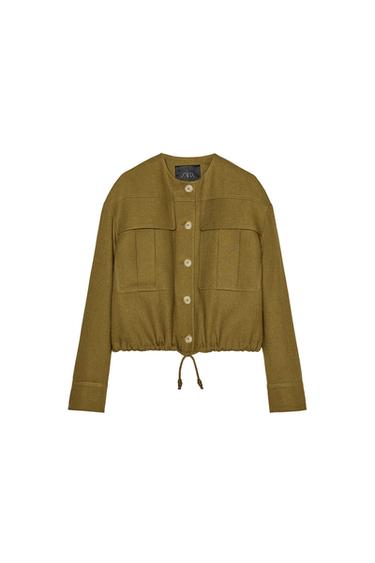 Front view of olive green jacket with front pockets and buttons.