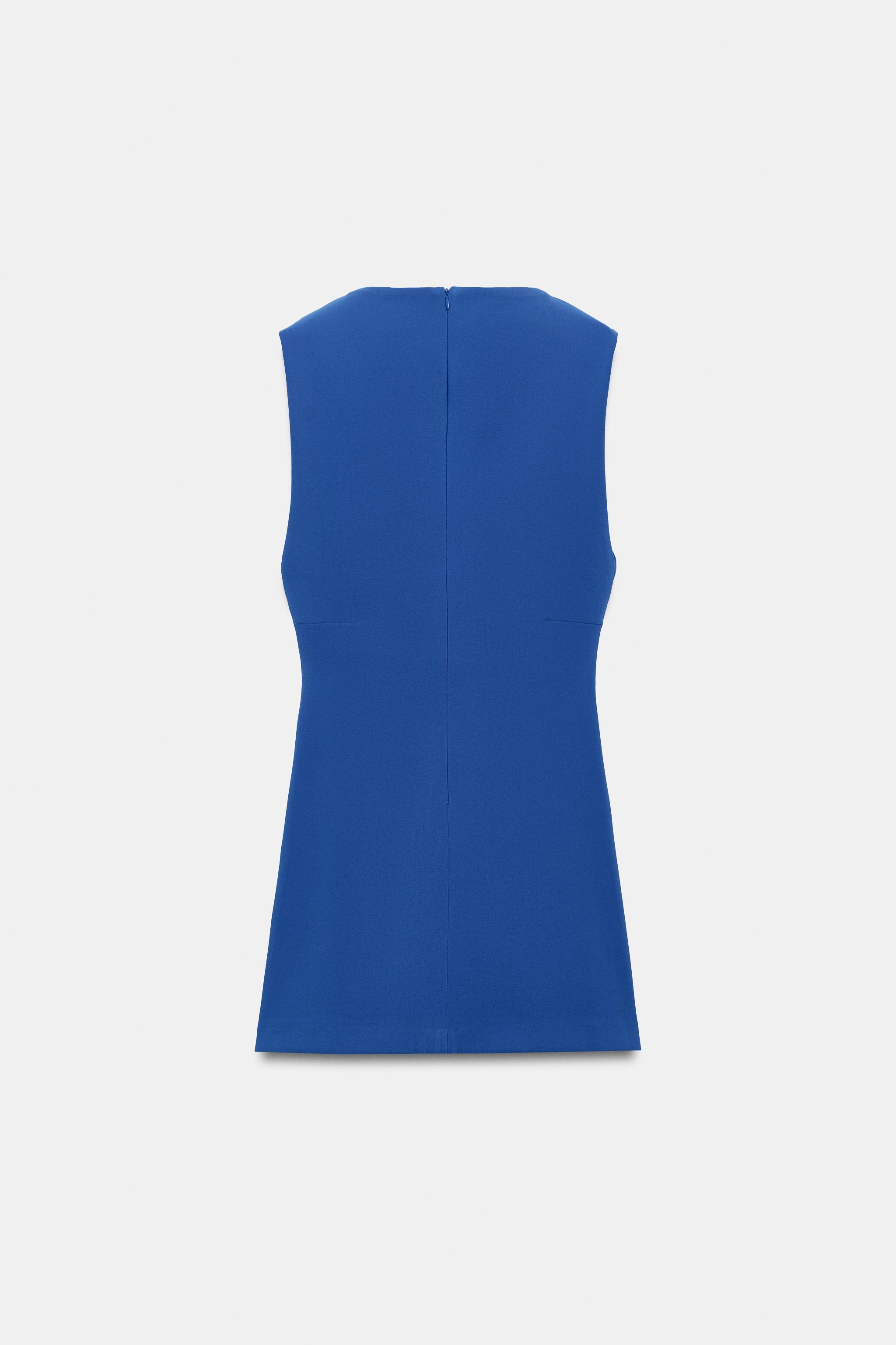 ROBE COURTE COL CHEMINÉE