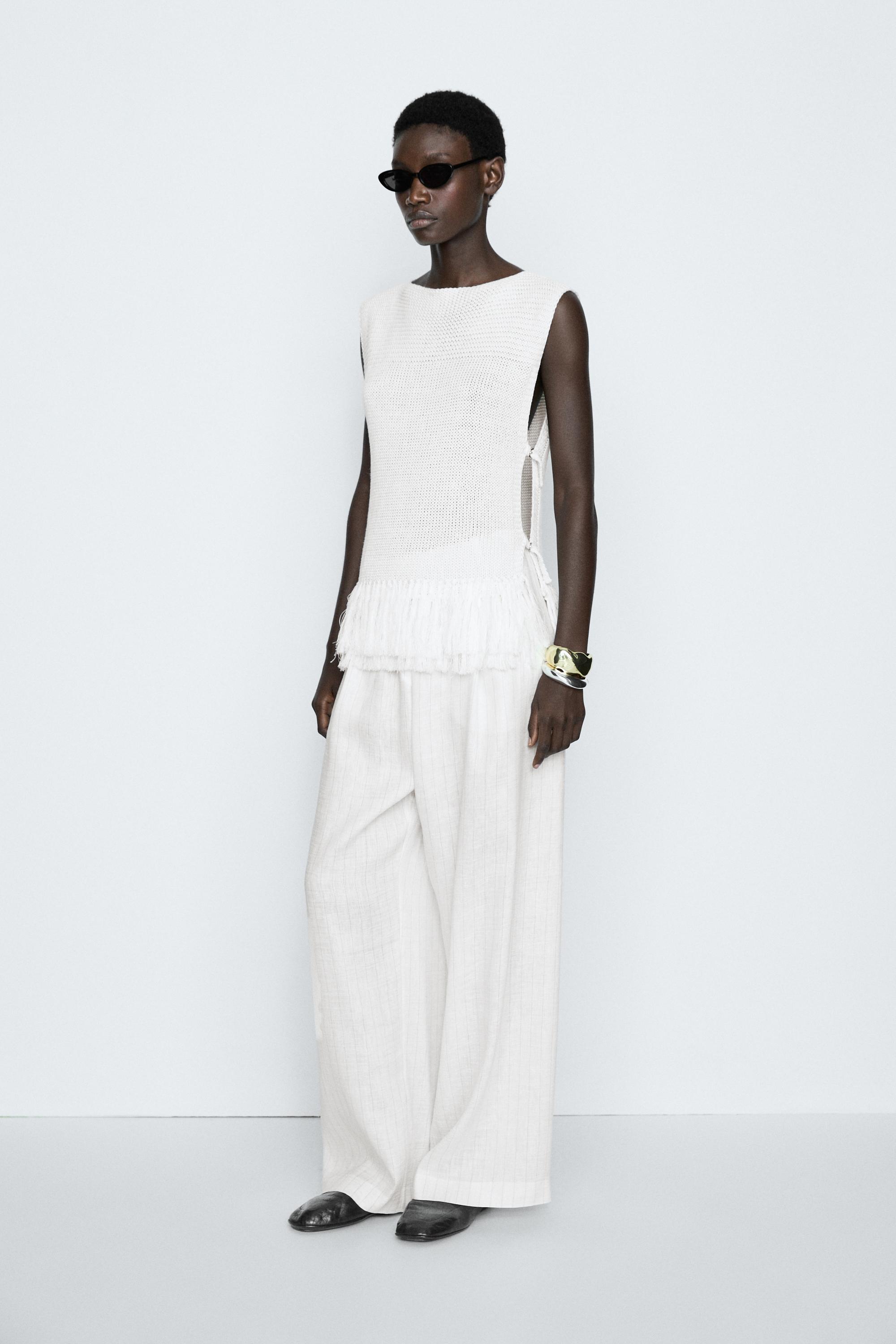 Fringe detail knit top - STUDIO