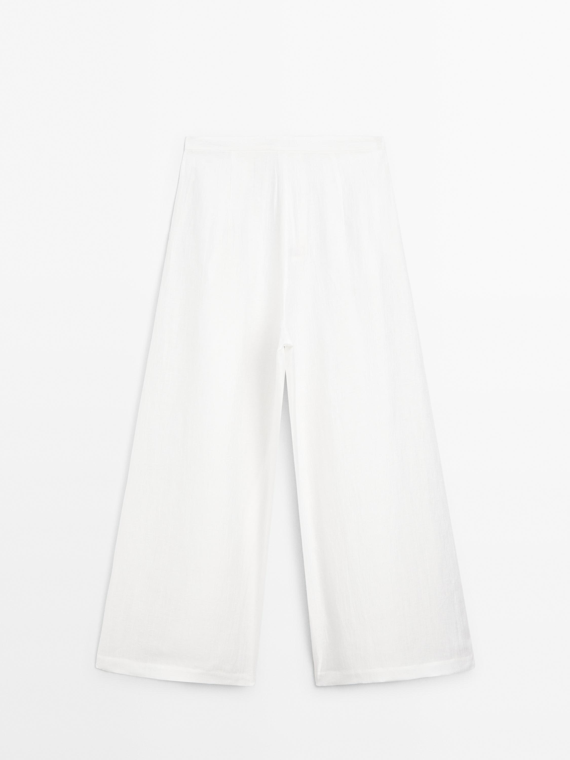 Wide-leg voluminous linen blend trousers
