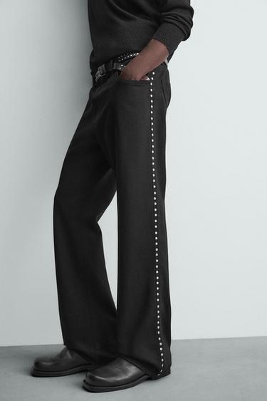 JEANS FLARE FIT TACHAS - Negro de Zara