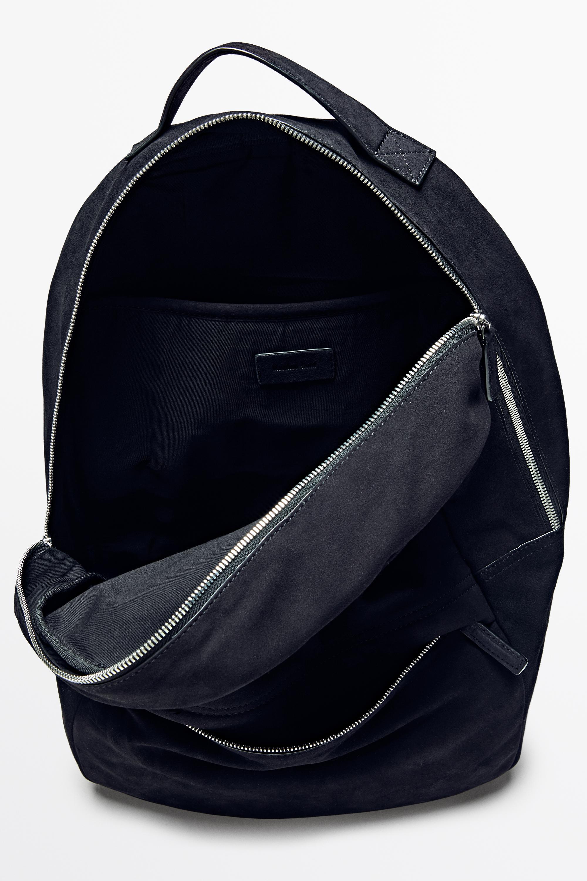Sac à dos en cuir et daim