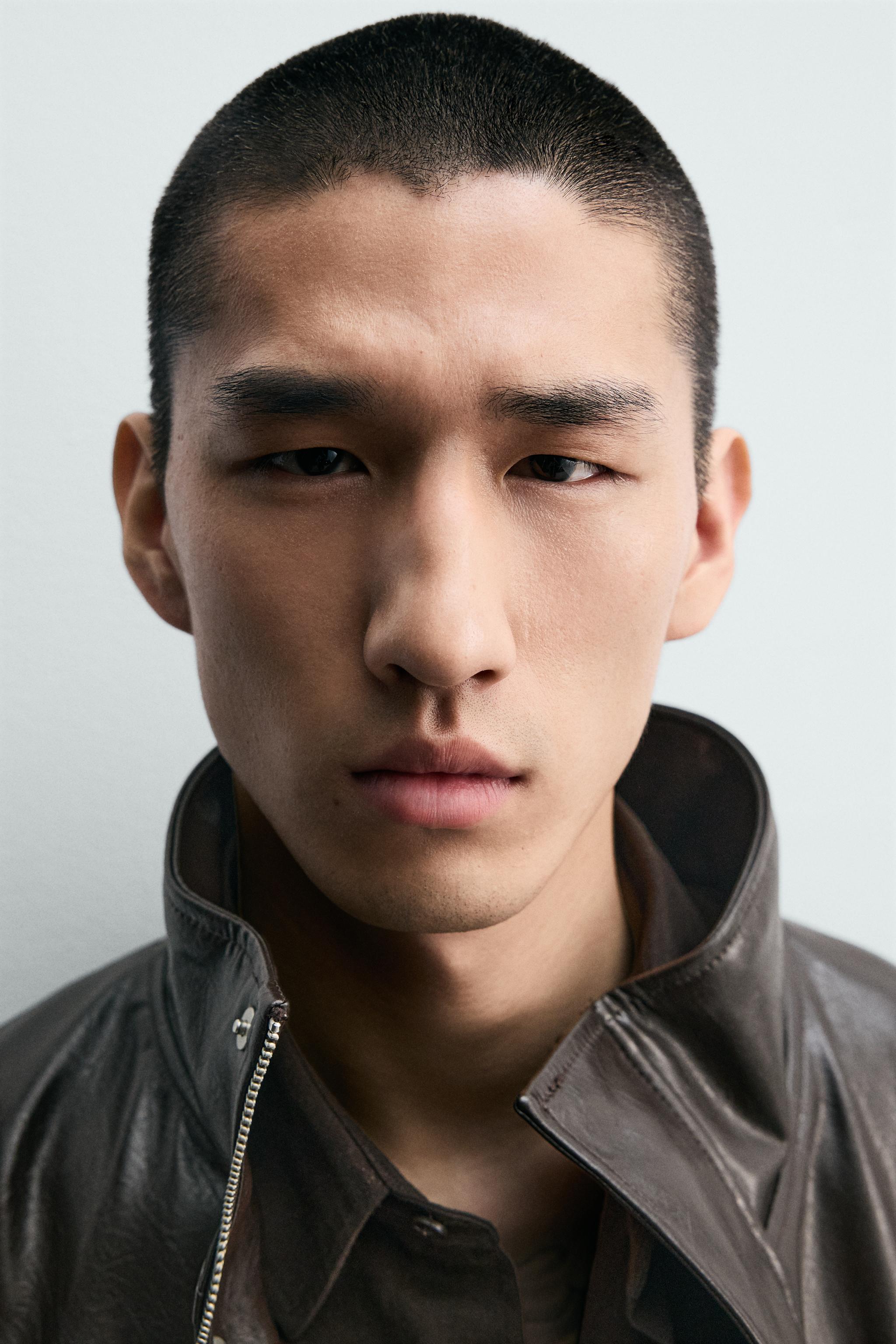 BLOUSON COURT MATIÈRE SYNTHÉTIQUE