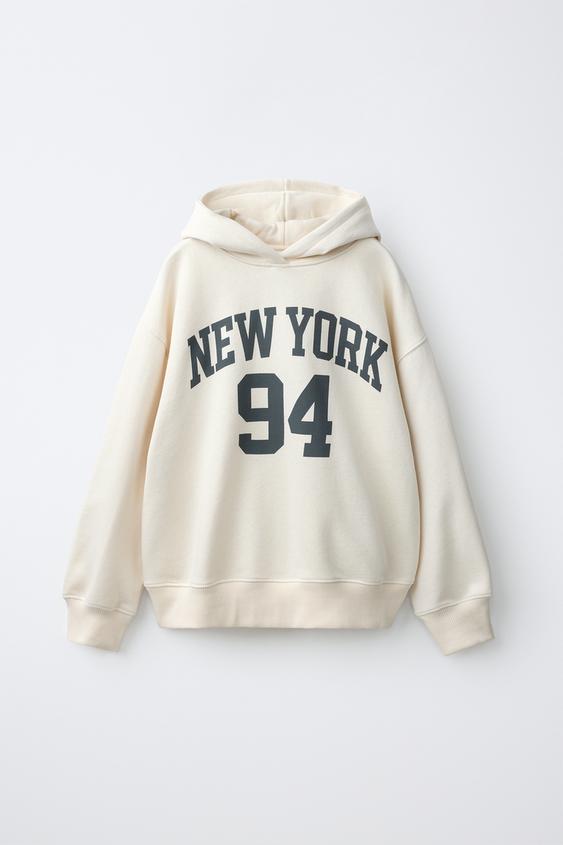 SUDADERA CAPUCHA VARSITY - Crudo de Zara - Imagen 0