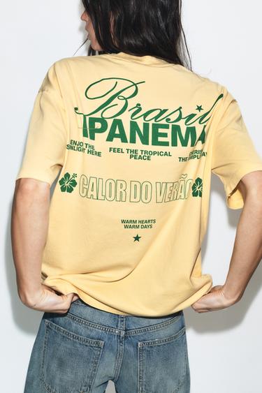 CAMISETA EFECTO LAVADO TEXTO - Amarillo de Zara