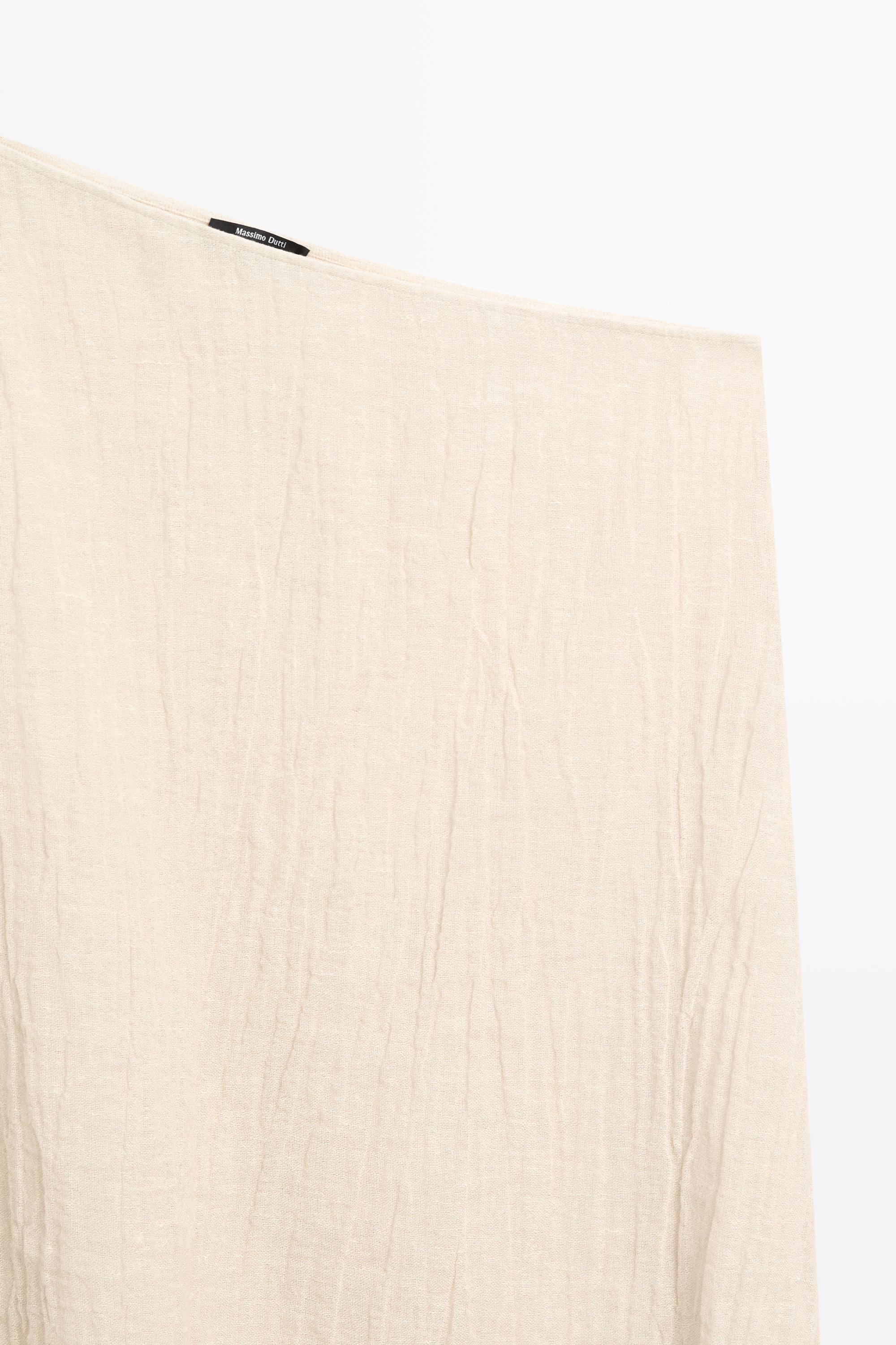 Total look asymmetric linen blend cape top