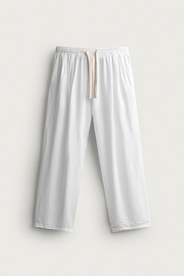 RELAXED FIT FLOWING TROUSERS - White by Zara