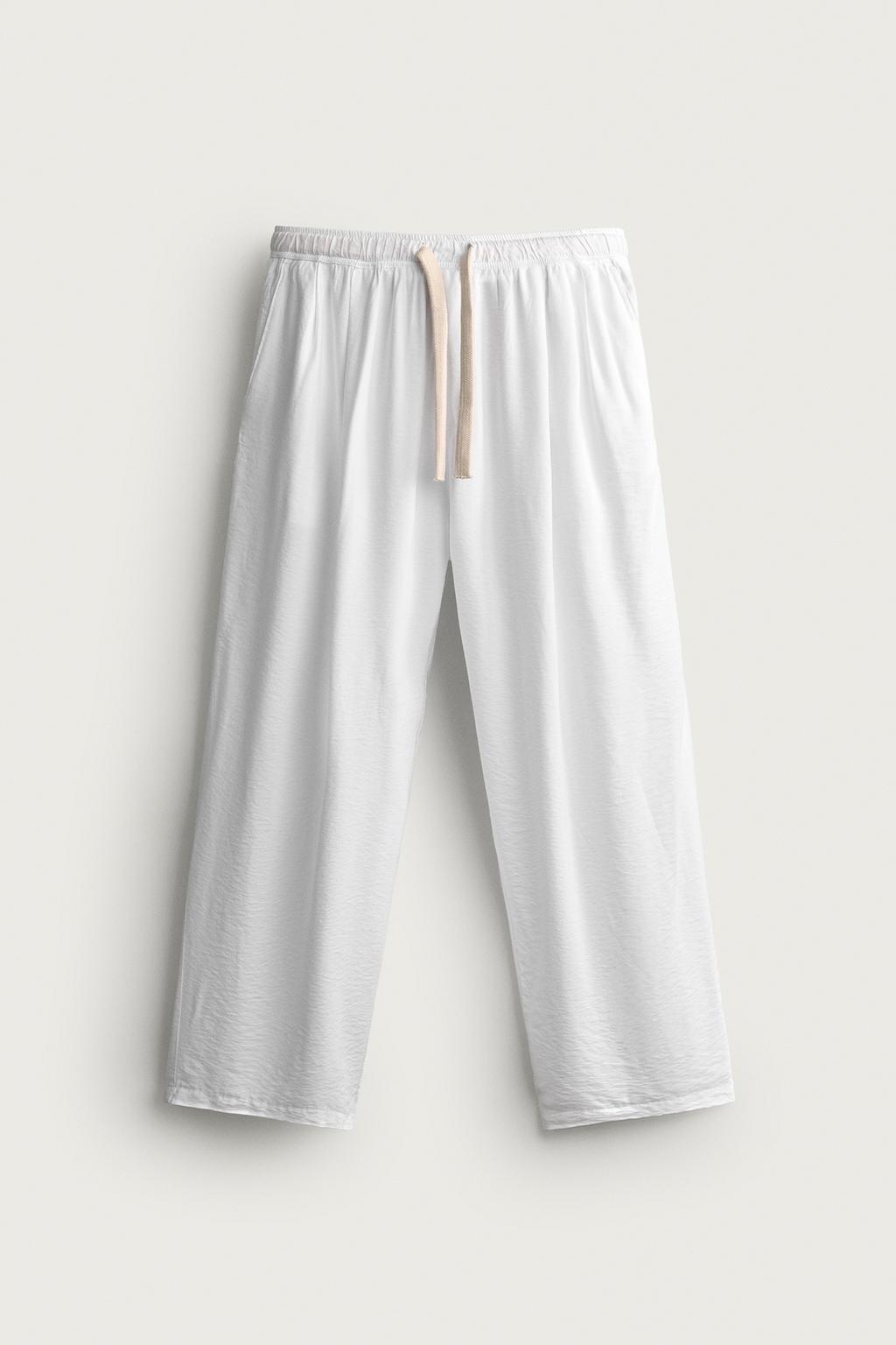 RELAXED FIT FLOWING TROUSERS