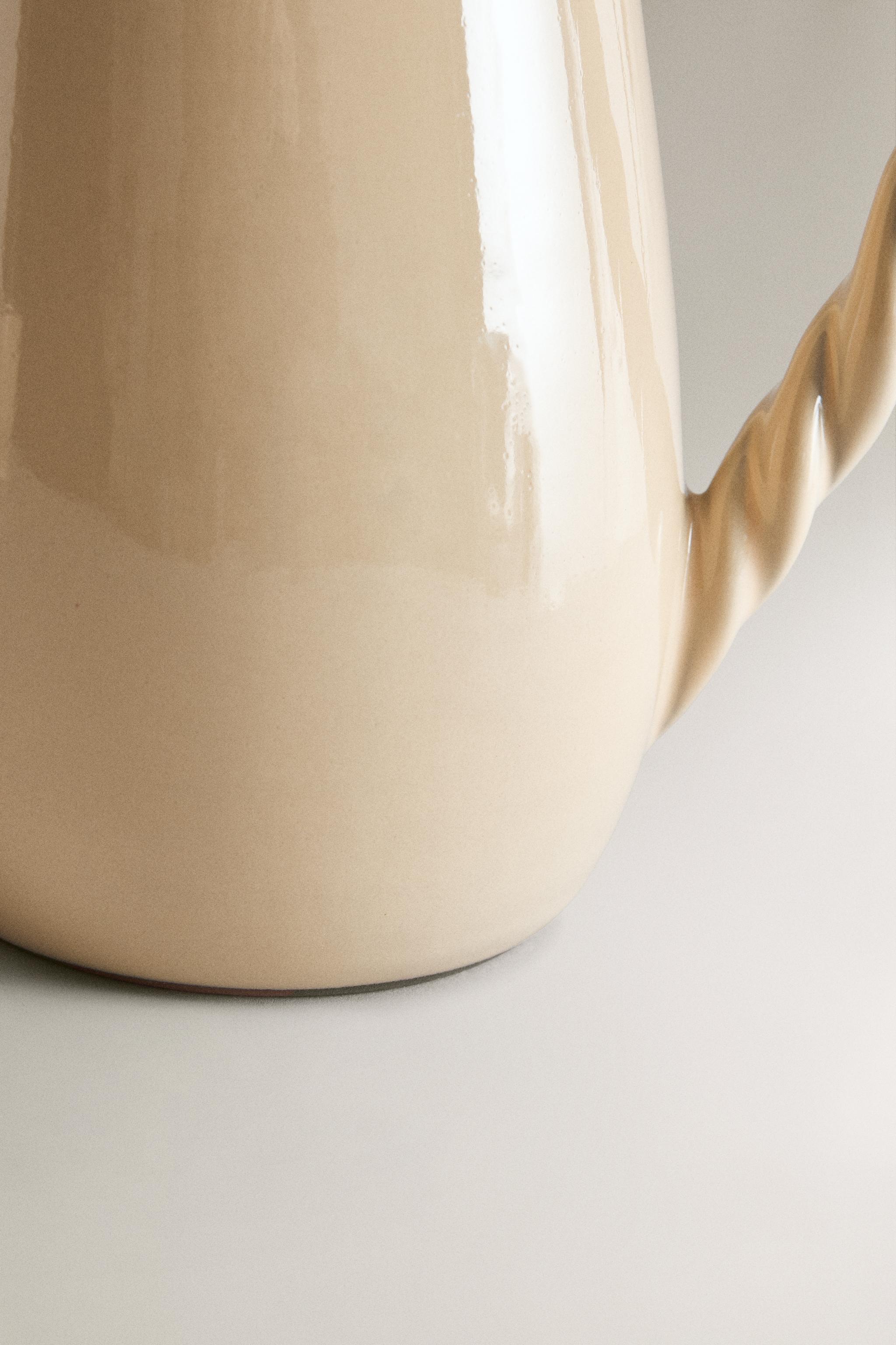 WOVEN TERRACOTTA PITCHER