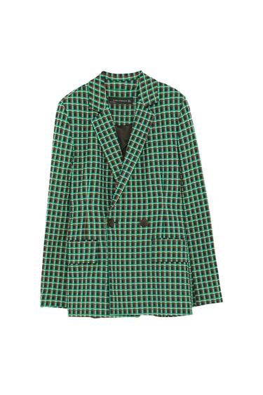 Front view of a green and black checked double-breasted blazer with front pockets.