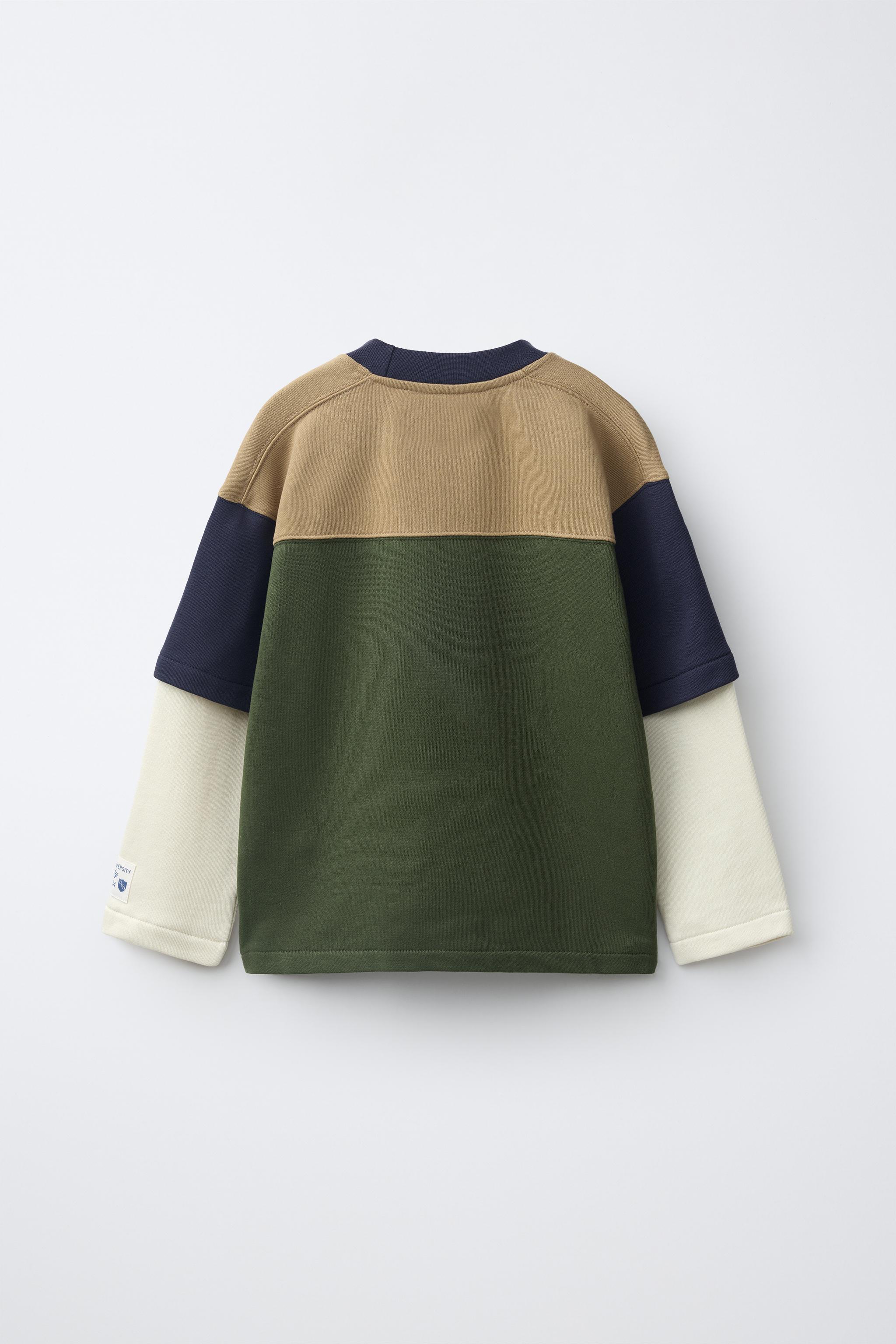 SUDADERA DOBLE MANGA NÚMERO VARSITY