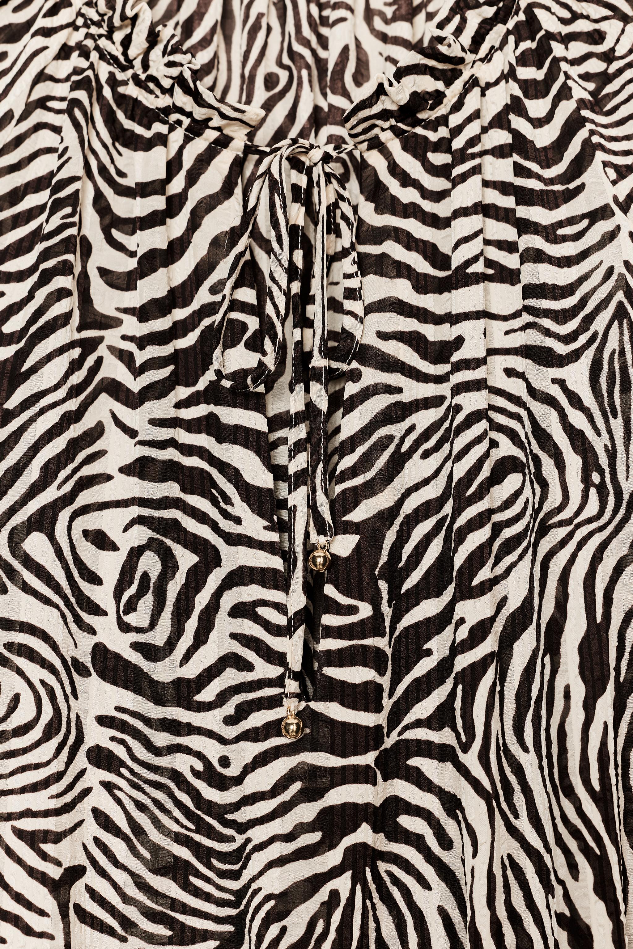 ANIMAL PRINT BELTED DRESS