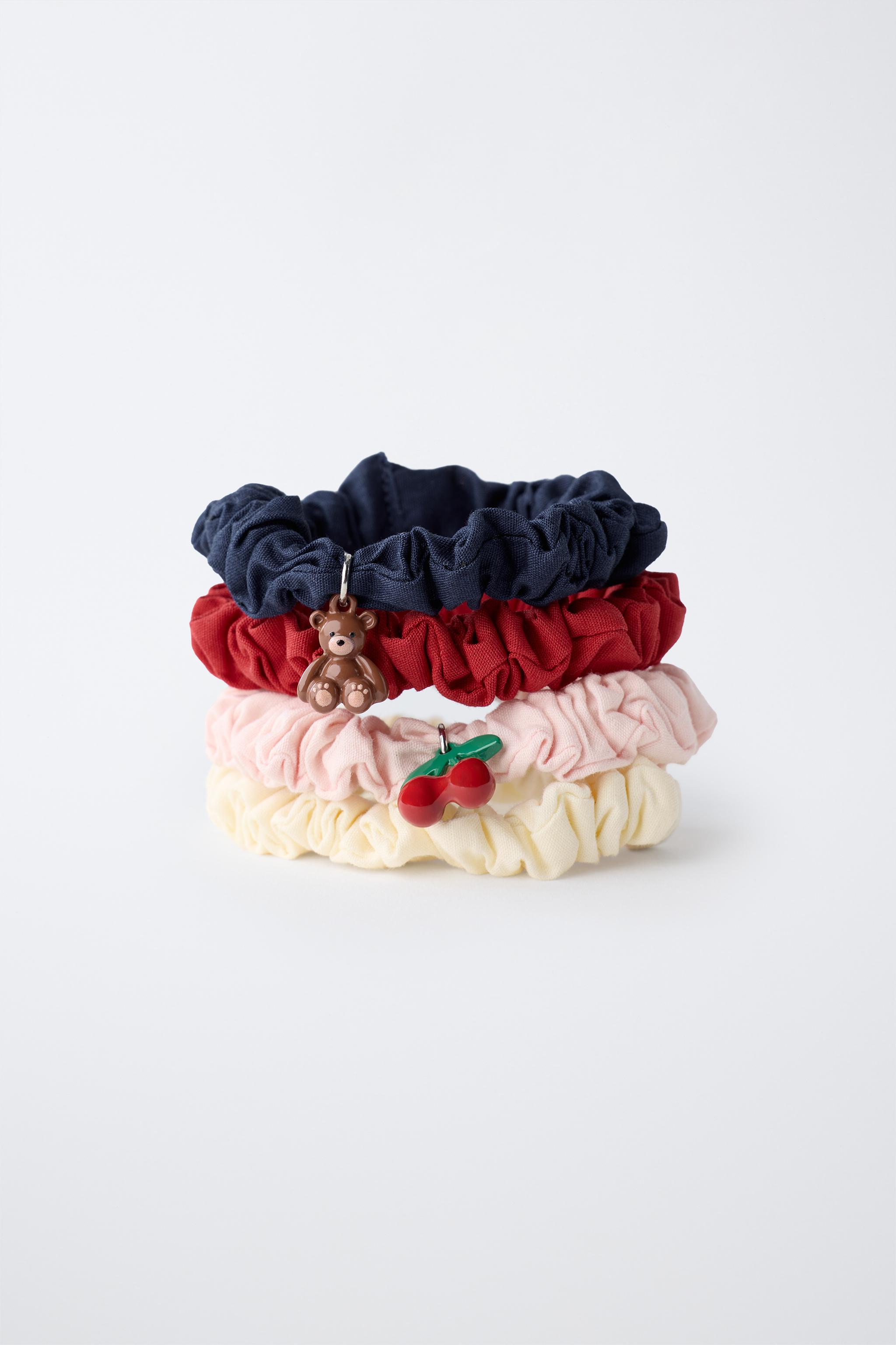 PACK OF FOUR CHARM HAIR TIES — Multicolored