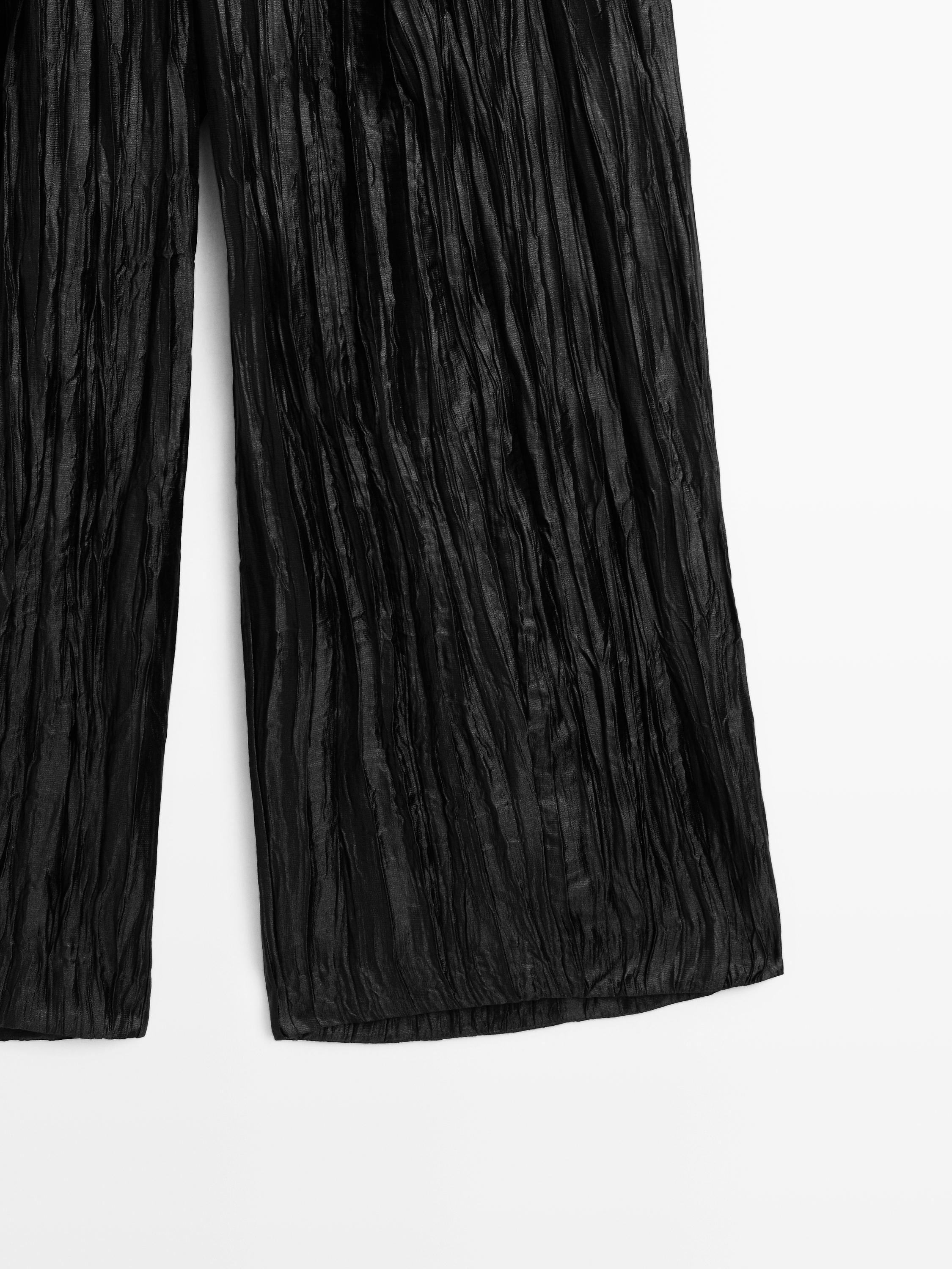 Creased pleated-effect wide-leg trousers