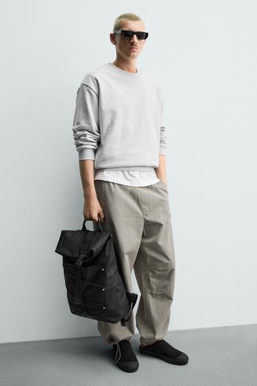 MOCHILA TÉCNICA ENGOMADA - Negro de Zara - Imagen 0