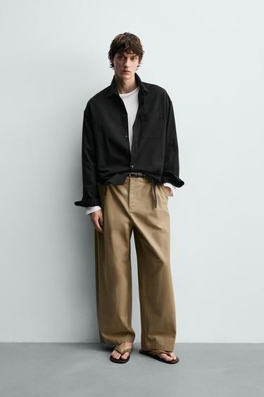 بنطلون وايد فيت بثنيات - بيج الخاص بـ Zara