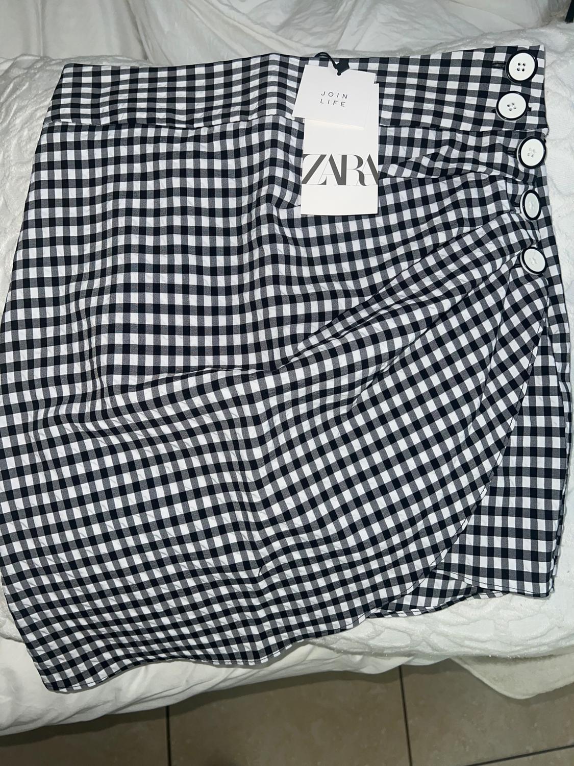 FALDA MIDI LENTEJUELAS