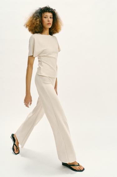 Zara Rastezljive hlače širokih nogavica – Ekru