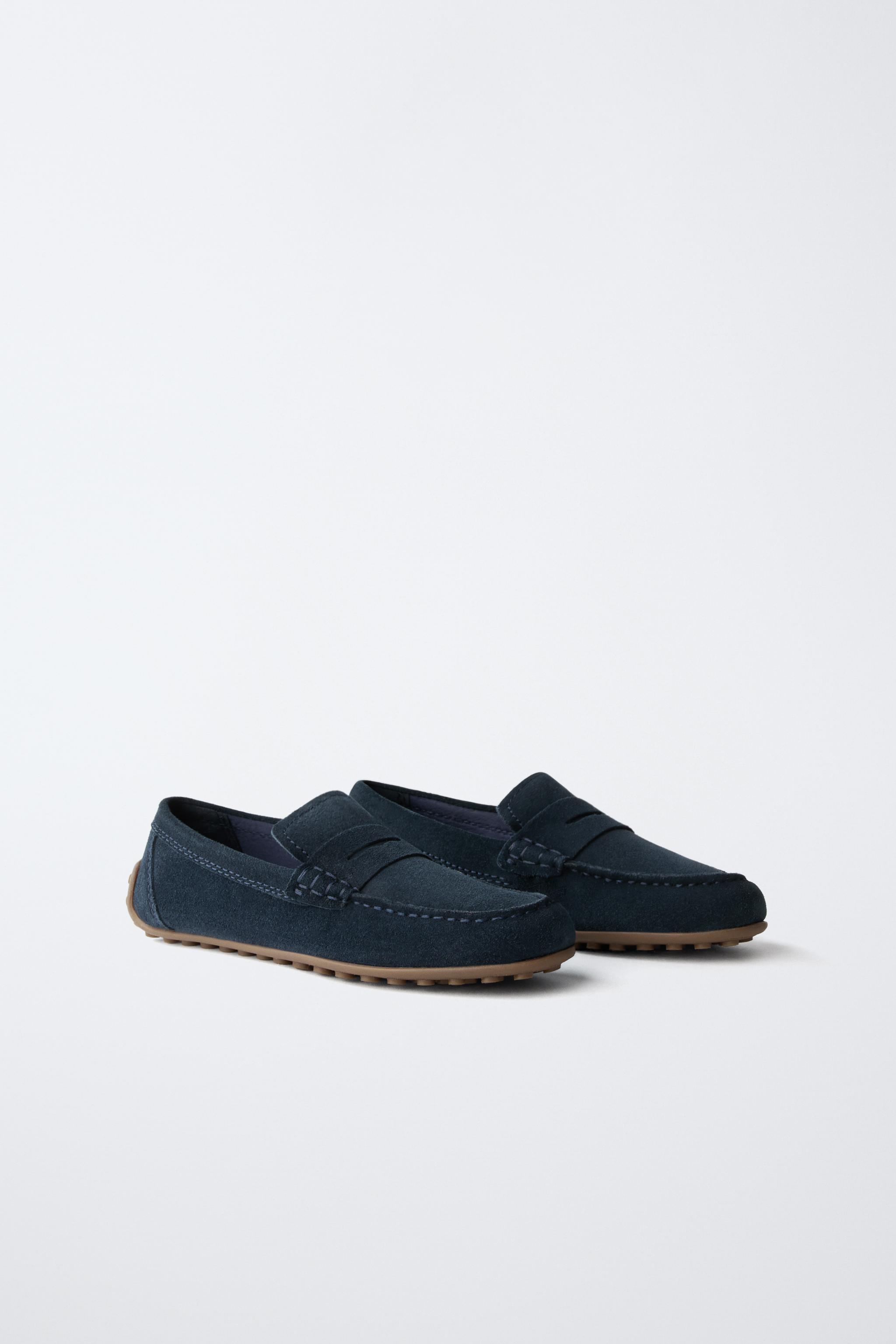 MOCASSINS EN CROÛTE DE CUIR