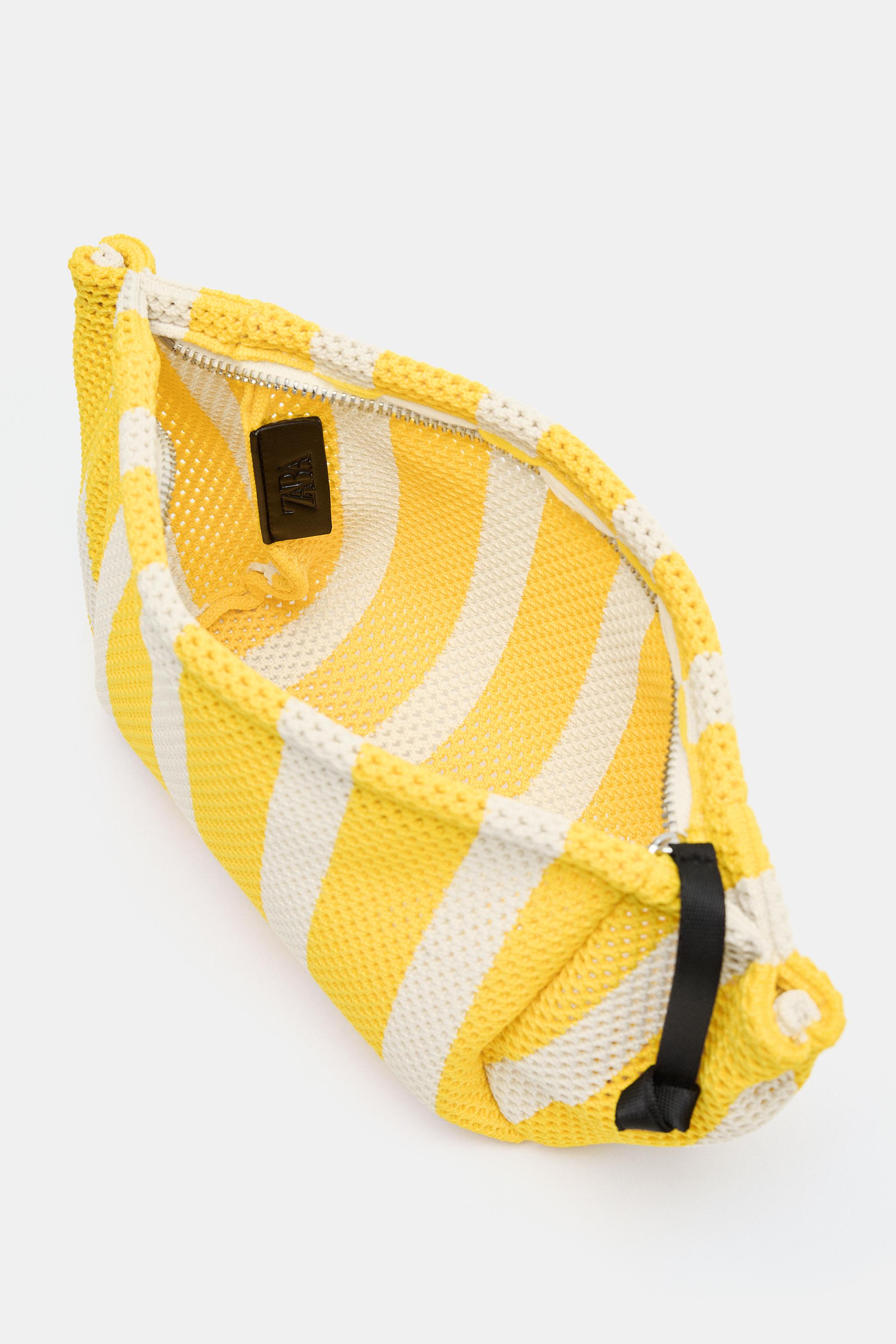 CUT-OUT EFFECT TOILETRY BAG