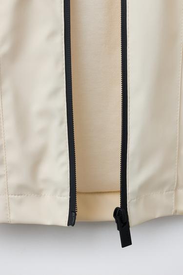 RUBBERISED WATER-REPELLENT HOODED RAINCOAT - Butter by Zara - Image 6
