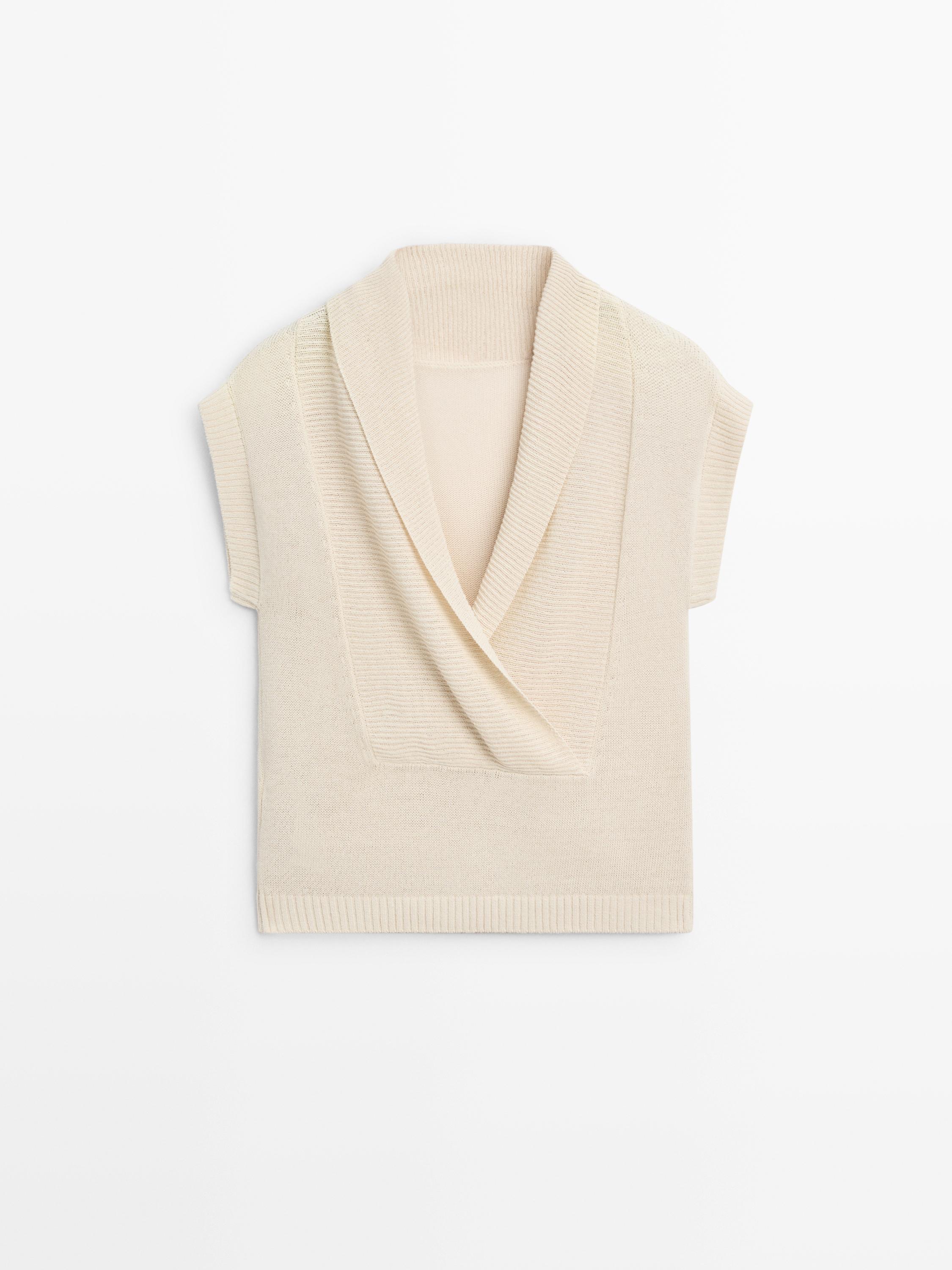 Pull en maille à dos décolleté