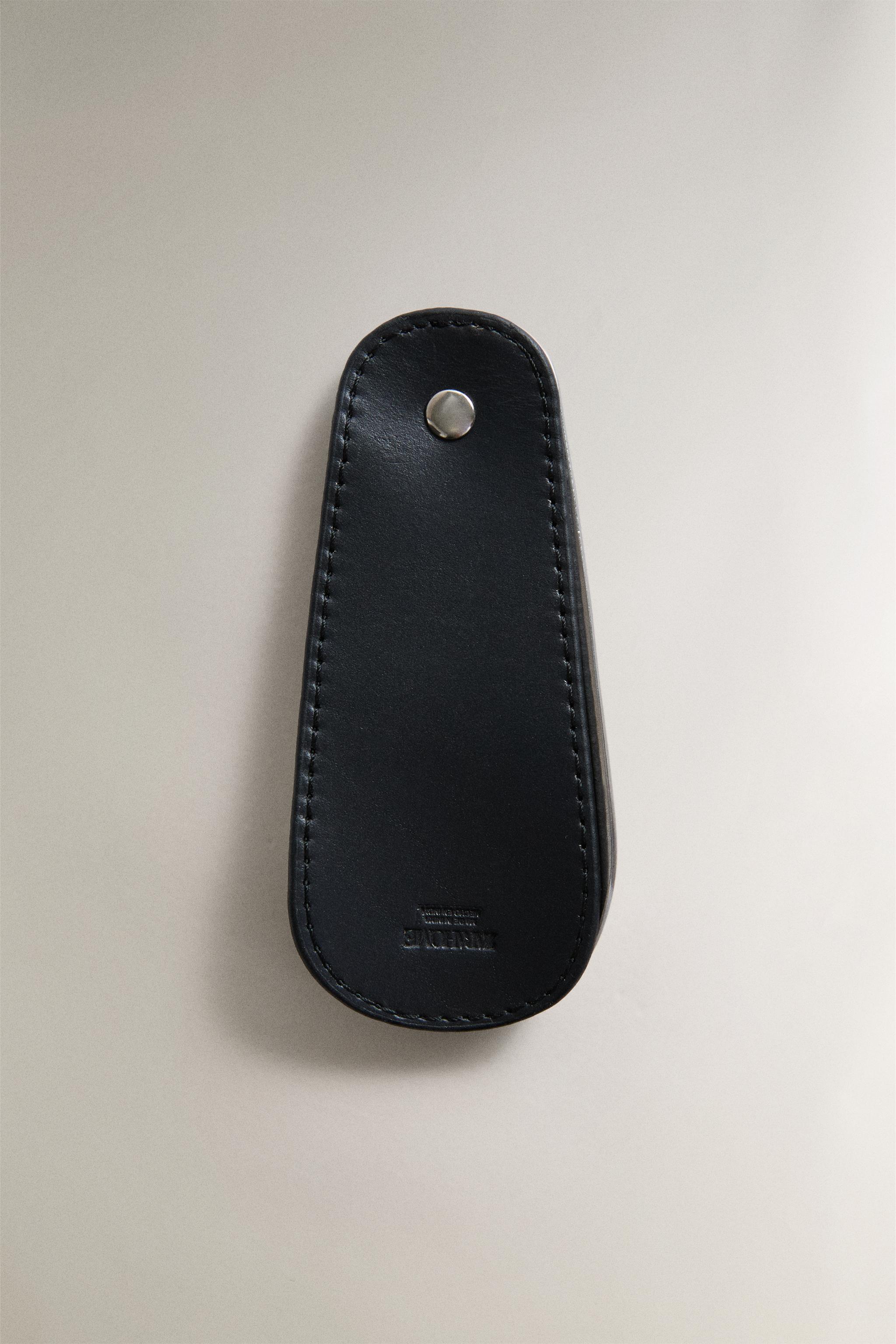 CHAUSSE-PIED DE VOYAGE ACIER ET CUIR