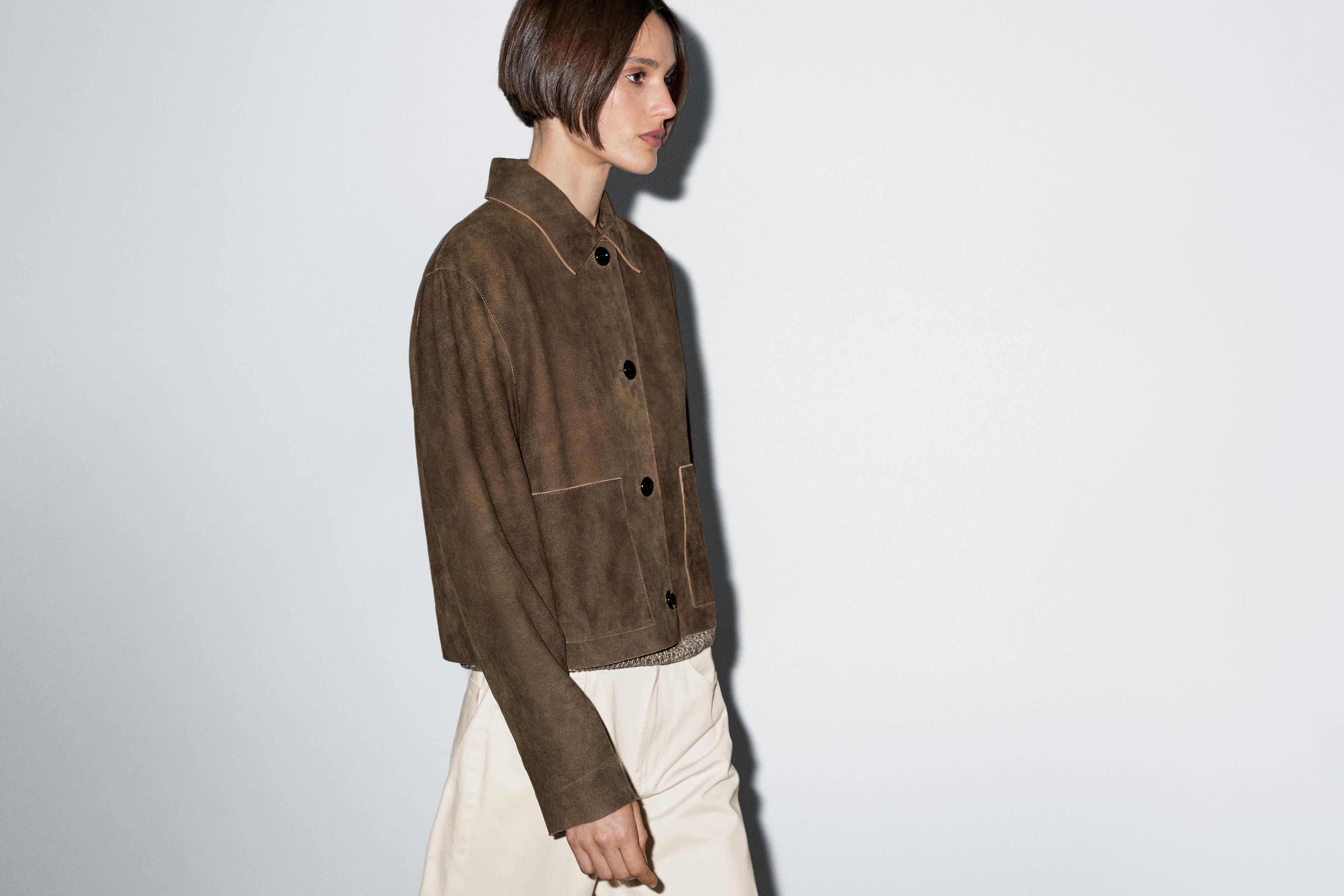 Short suede leather jacket with pocket details