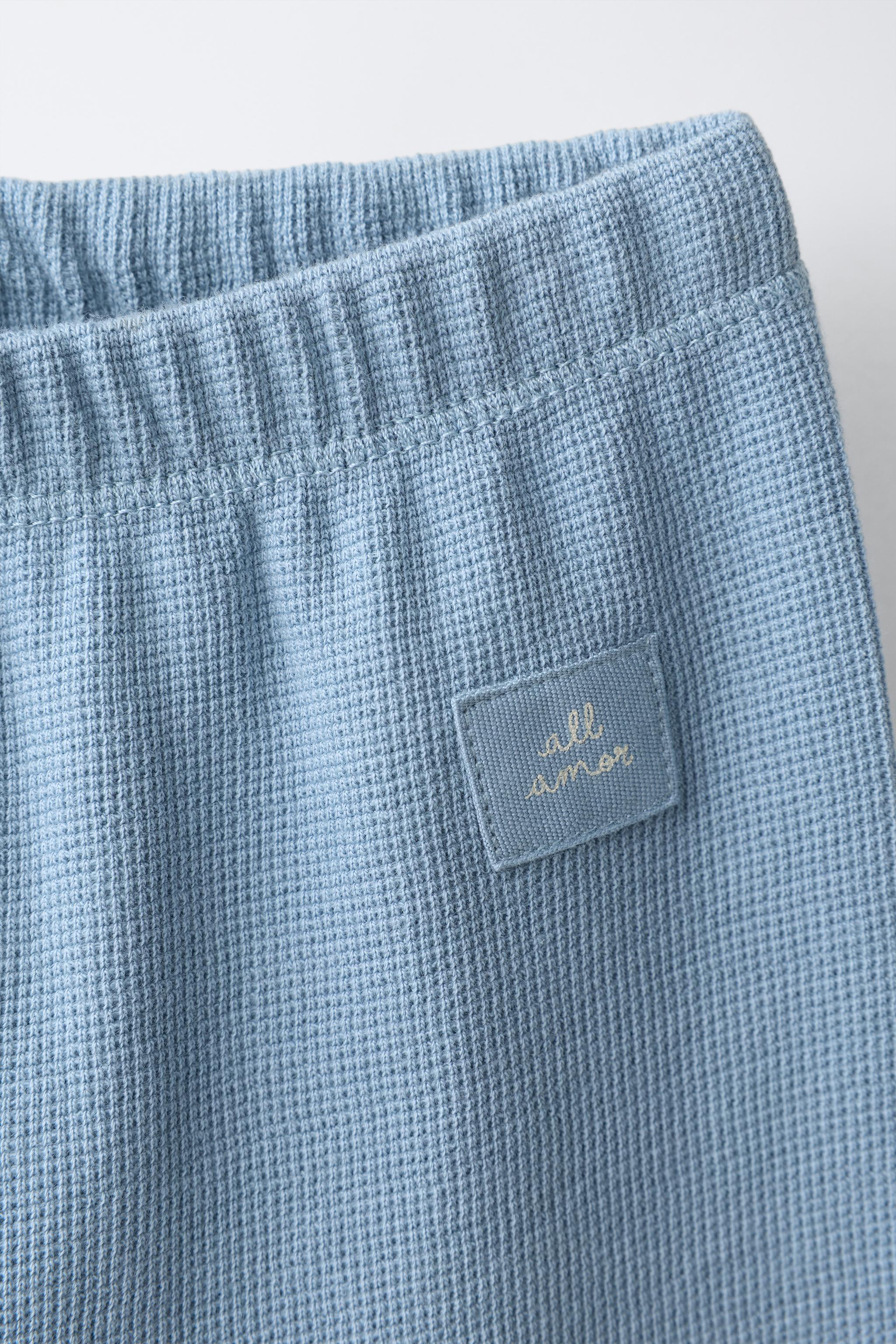 EMBOSSED WRAP TOP AND LEGGING SET