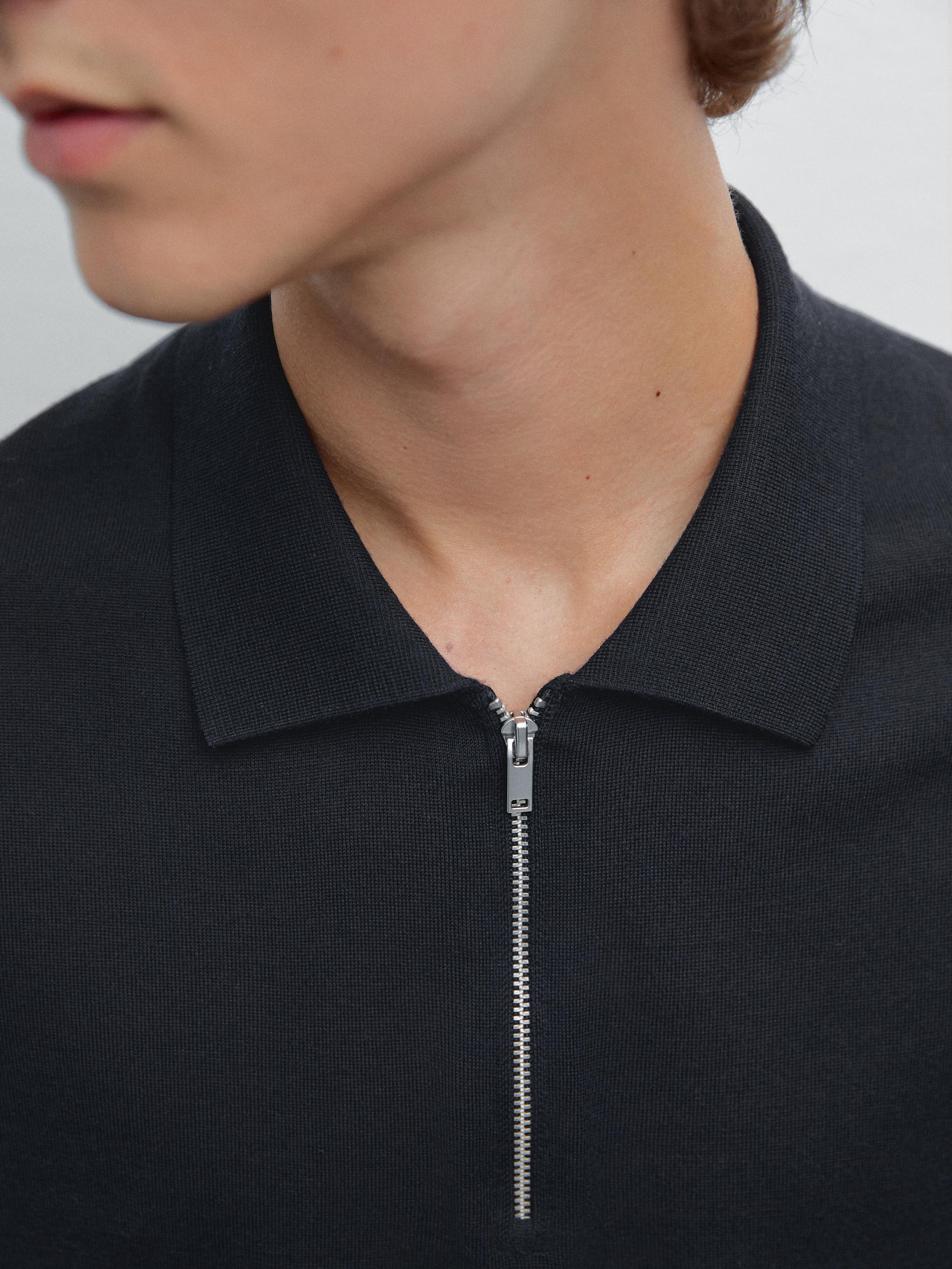 Polo en maille à col zippé