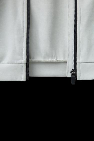 SUDADERA INTERLOCK CREMALLERA CAPUCHA LOGO - Piedra de Zara