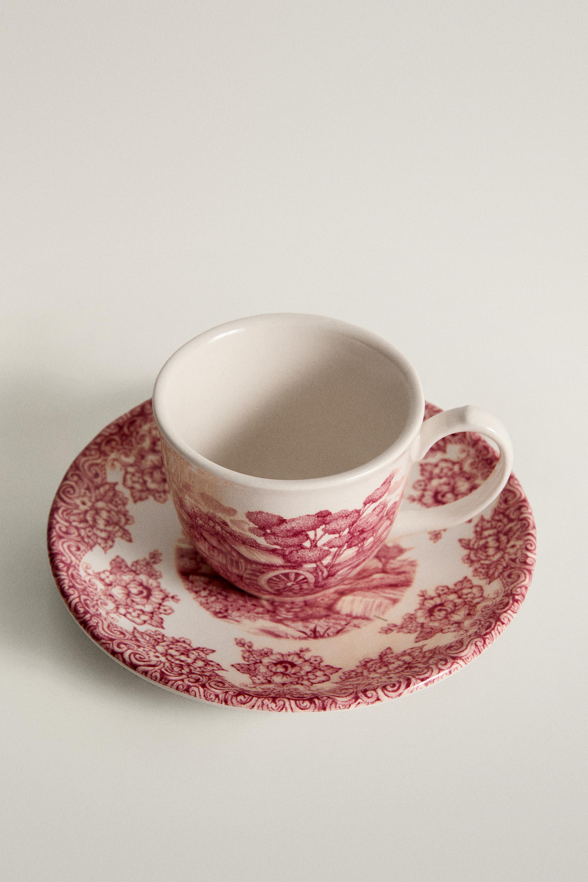 FLORAL AND LANDSCAPE EARTHENWARE COFFEE CUP AND SAUCER SET