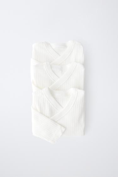 حزمة من ثلاثة bodies بأكمام طويلة وياقة متداخلة - أبيض مكسور by Zara