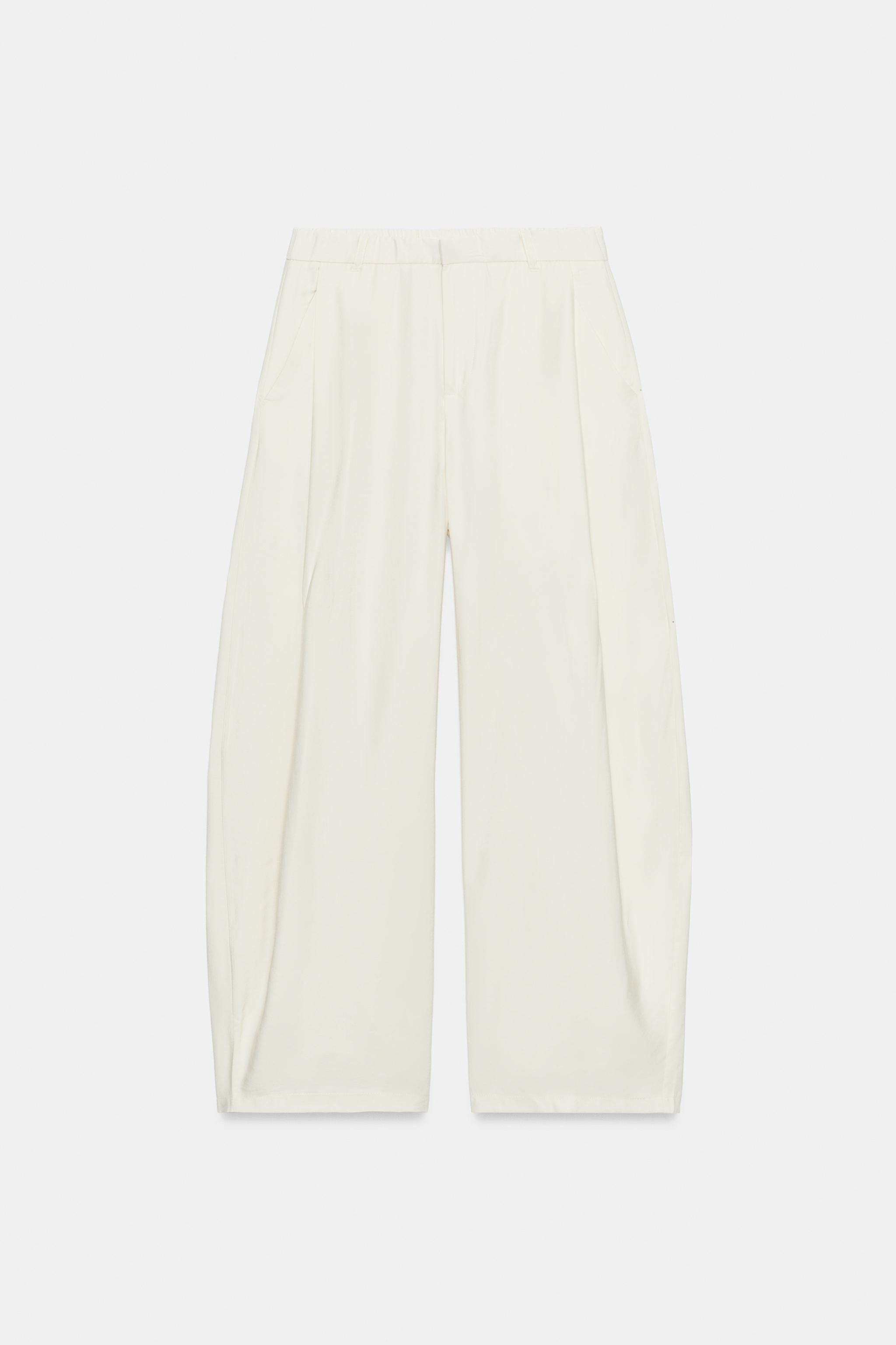 FLOWY PLEATED PANTS