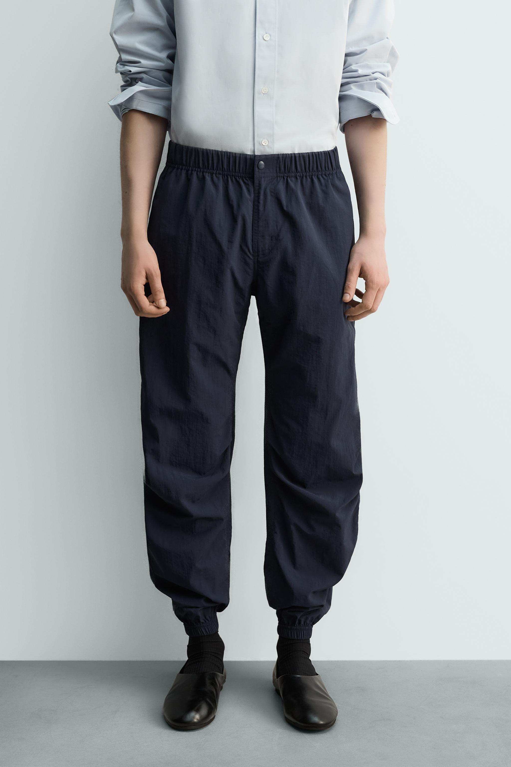 LIMITED EDITION RELAXED FIT TECHNICAL TROUSERS