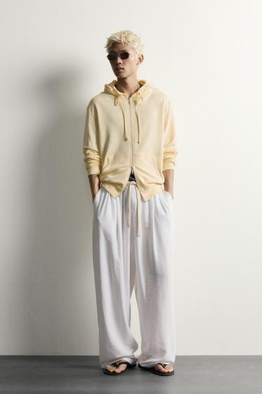 RELAXED FIT FLOWING TROUSERS - White by Zara