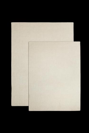 UNIFARBENER SCHURWOLLE-BAUMWOLL-TEPPICH - Hellbeige von Zara