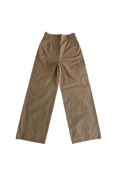 PANTALÓN ANCHO ACAMPANADO BEIGE