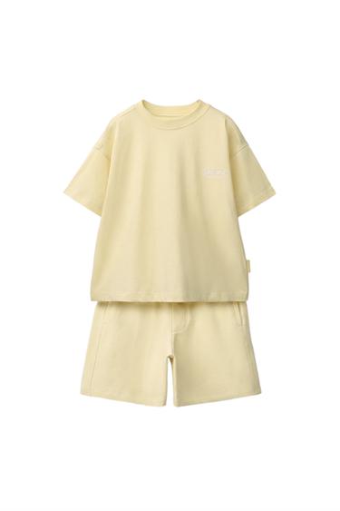 CONJUNTO CAMISETA Y BERMUDA TEXTO - Amarillo claro de Zara - Imagen 0