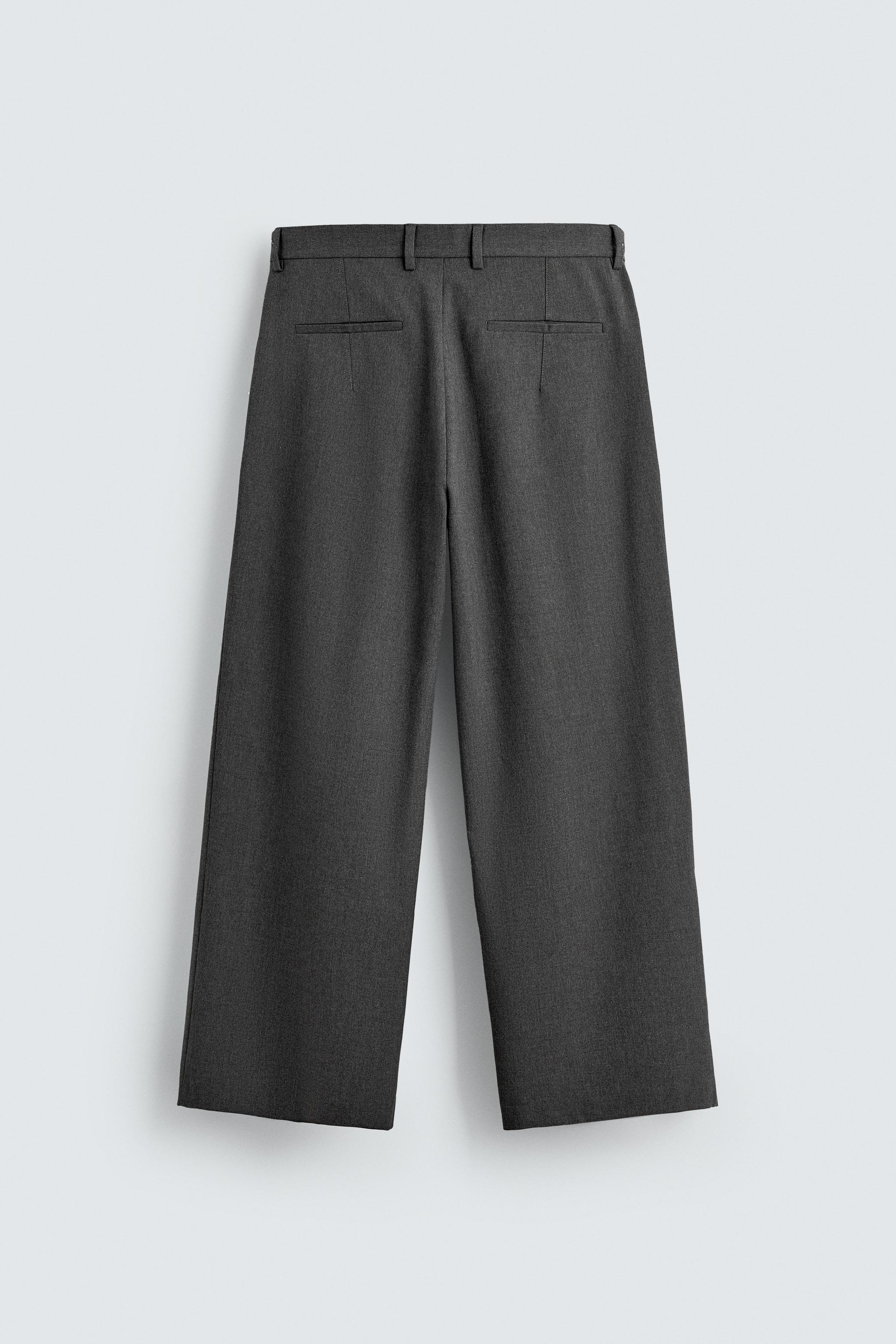 PANTALON À PLIS RAYURES