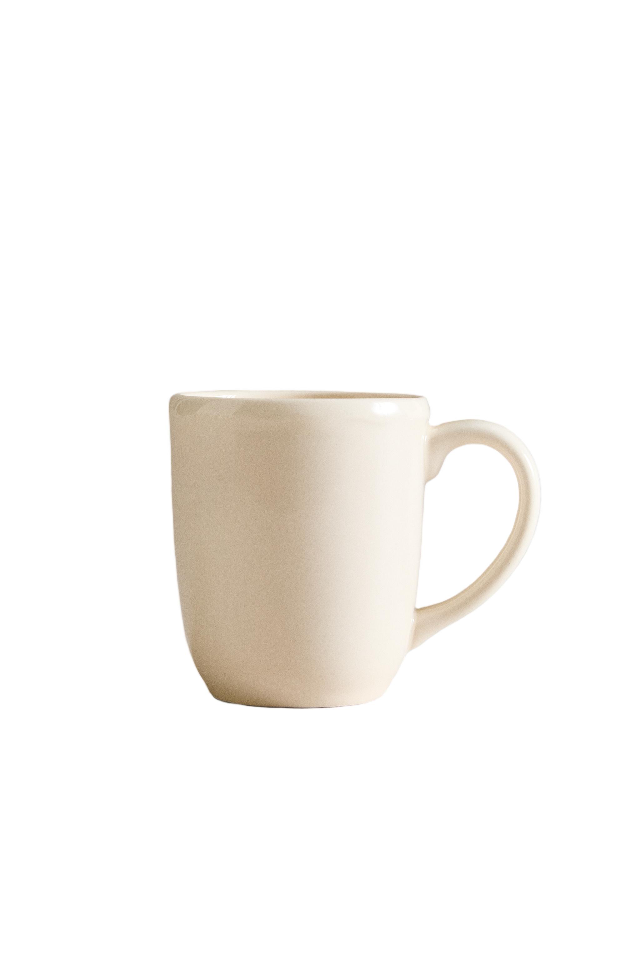 EARTHENWARE MUG WITH A RAISED-DESIGN EDGE