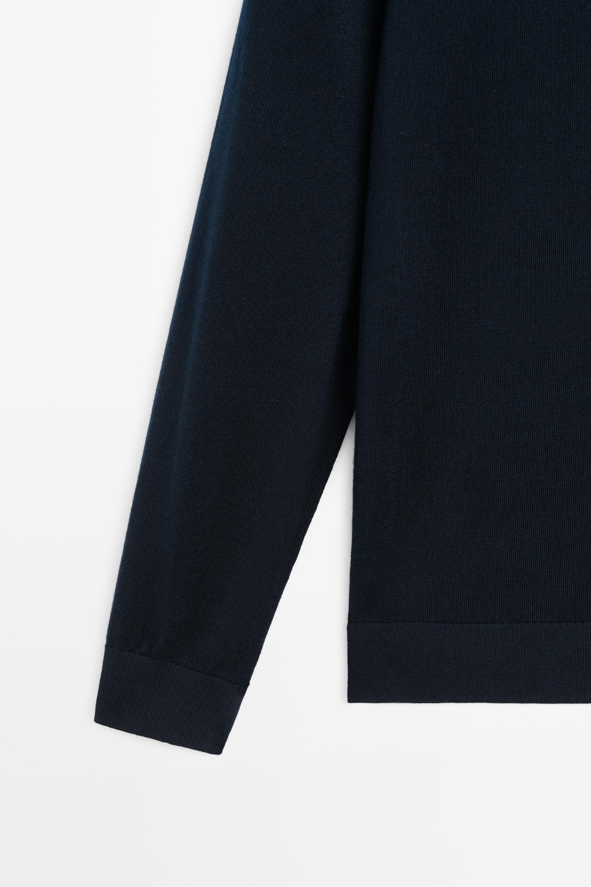 Pull col montant en maille mérinos mélangée