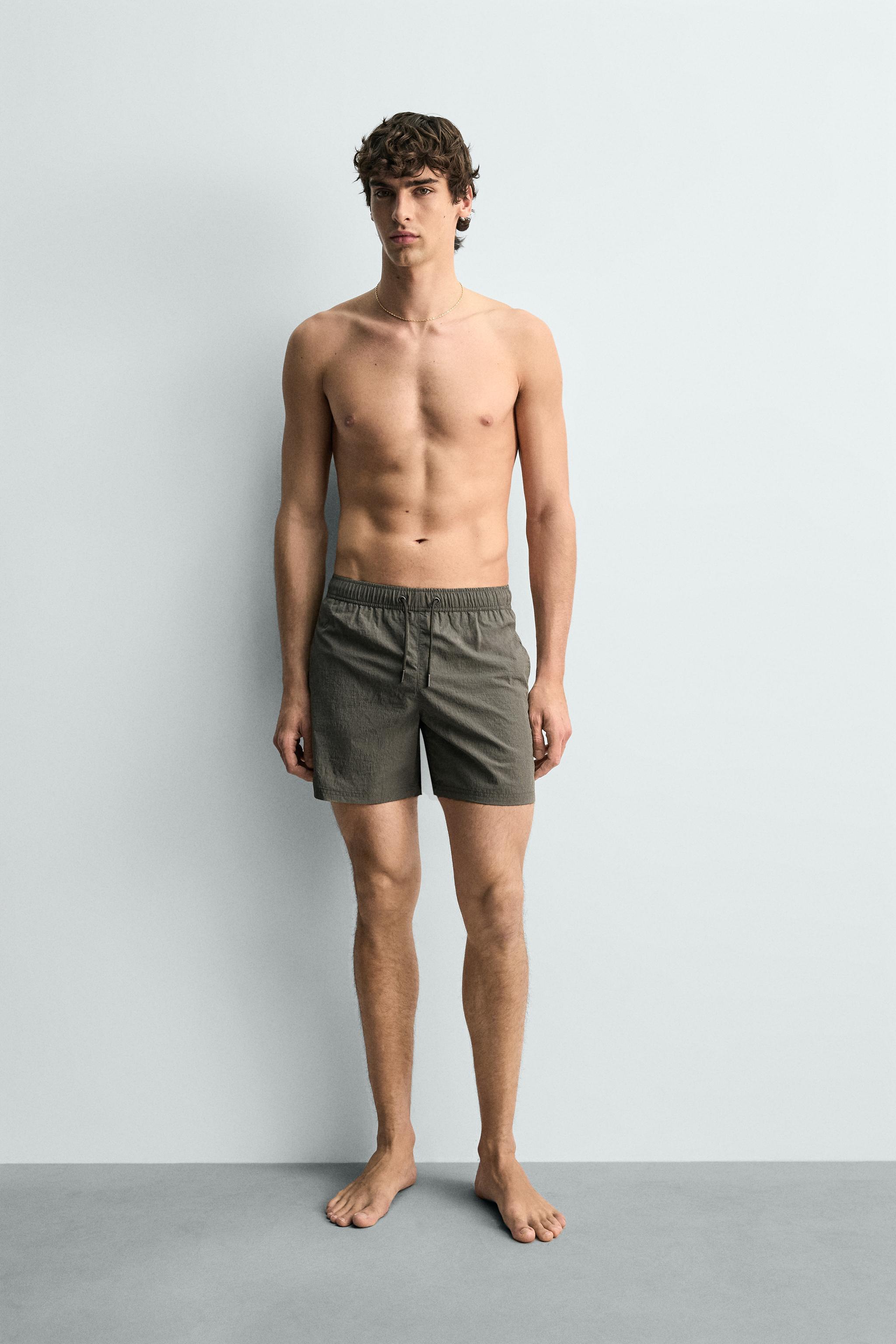 STRIPED MID-LENGTH SWIMSUIT