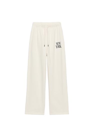 بنطلون مستقيم بنص - أبيض مكسور by Zara