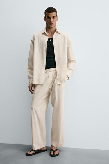 CALÇA RELAXED FIT LISTRADA - Manteiga da Zara